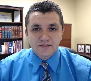 This is a photo of Ardian Gjoka, legal counselor at VisaNation.